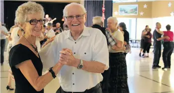  ?? WENDY LIVINGSTON­E ?? Grant Whitfield and Yvonne Kessler dance to the music of Los Penguios Locos at the Regina Senior Citizens Centre on Winnipeg Street. Whitfield is 97.