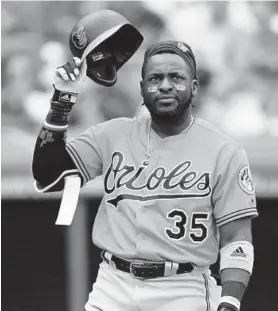  ?? TONY DEJAK/AP ?? The Orioles’ Dwight Smith Jr. takes off his helmet after striking out in the third inning against the Indians on Sunday in Cleveland. The O’s struck out 15 times.