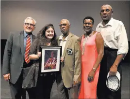  ?? David Guzman ?? Las Vegas-review-journal Las Vegas Review-journal videograph­er Rachel Aston, second from left, accepts a Ward 5 Chamber of Commerce award Monday at Eclipse Theaters in Las Vegas. With her, from left, are lieutenant governor candidate Ed Uehling, Paran ElksLodge President Charles Barber, chamber President Katherine Duncan and former Assemblyma­n Harvey Munford.