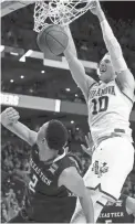  ?? SPORTS WINSLOW TOWNSON/USA TODAY ?? Villanova guard Donte DiVincenzo dunks against Texas Tech on Sunday in Boston.