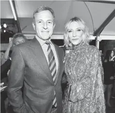  ?? — Reuters file photo ?? Actress Cate Blanchett and Disney CEO Iger arrive at the world premiere of ‘Thor: Ragnarok’, in Los Angeles last month.