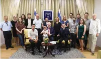  ?? (Mark Neiman/GPO) ?? PRESIDENT REUVEN RIVLIN hosts members of the LGBT community and Open House at his residence yesterday.