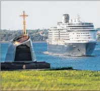  ?? BRIAN MCINNIS/THE GUARDIAN ?? The cruise ship Zuiderdam glides past the Acadian memorial at Fort Amherst as it leaves Charlottet­own after a recent visit in this Guardian file photo. Port Charlottet­own is preparing for a record-breaking season this year with 94 scheduled cruise ship...