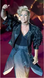  ?? — AP ?? (Left) US singer Pink performs on the Waldbuehne (‘Forest Stage’) in Berlin on Friday.