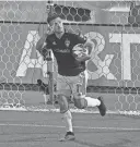  ?? RON CHENOY/USA TODAY SPORTS ?? Colorado Rapids forward Diego Rubio picks up the ball following a penalty kick scored last summer. Austin FC could target the free agent forward.