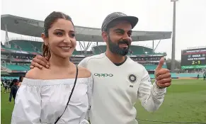  ?? AP ?? Virat Kohli and Bollywood actress wife Anushka Sharma after India’s historic away test series win over Australia in Sydney this month.