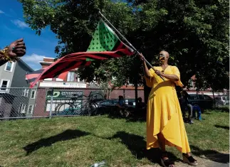  ??  ?? STANDARD BEARER Pressley at a Juneteenth celebratio­n in Boston.
“I’m very encouraged by the sustainabi­lity of this current chapter in the civil-rights movement,” she says.