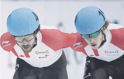  ?? GRAHAM HUGHES/THE CANADIAN PRESS FILES ?? Samuel Girard, 20, right, says his goal is not so much to knock off Charles Hamelin, 32, left. “I think it will come naturally,” he says. The young guns will get a chance to show they’re stuff at the team’s fall trials this weekend at the Maurice Richard Arena.