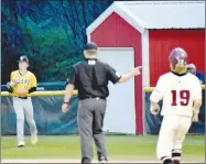  ?? MARK HUMPHREY ENTERPRISE-LEADER ?? Prairie Grove first baseman Connor Hubbs (left) makes a catch in foul territory to record an out in the fifth inning. Moments earlier the field umpire inadverten­tly clotheslin­ed Hubbs preventing him from making a similar play. The Tigers got out of the inning unscathed, but gave up an RBI double to Slayter Watkins with two outs in the bottom of the seventh and lost, 3-2, in the first-round of District 4A-1 baseball action on Tuesday, April 27. The loss ended Prairie Grove’s season.