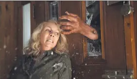  ?? Ryan Green / Associated Press ?? Jamie Lee Curtis in a scene from “Halloween,” in theaters nationwide on Oct. 19.