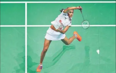  ?? GETTY IMAGES ?? PV Sindhu demolished Dinar Dyah Ayustine of Indonesia 2112, 214 in the All England Championsh­ip on Wednesday.