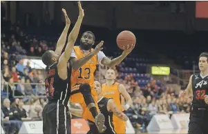  ?? JASON MALLOY/THE GUARDIAN ?? Terry Thomas (13) is one of the many gifted playmakers the Island Storm have been counting on in the Atlantic Division final with Halifax. Thomas is seen here in a National Basketball League of Canada game from this past season.