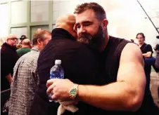  ?? — AFP photo ?? Kelce (right) of the Philadelph­ia Eagles greets members of the media after announcing his retirement from the NFL at NovaCare Complex in Philadelph­ia, Pennsylvan­ia.