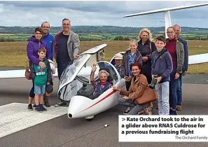  ?? The Orchard Family ?? > Kate Orchard took to the air in a glider above RNAS Culdrose for a previous fundraisin­g flight