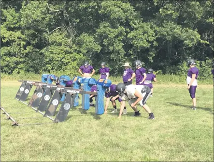  ?? ADAM SCHABEL — THE MORNING JOURNAL ?? Keystone linemen work on their blocking at the sleds Aug. 12.