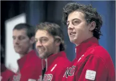  ?? JONATHAN HAYWARD/THE CANADIAN PRESS ?? Mark McMorris of Regina, right to left, Tyler Nicholson of North Bay, Ont. and Max Parrot of Bromont, Que., stand on stage as Canada’s slopestyle and big air snowboard team is announced during a news conference in Whistler, B.C., Tuesday.