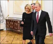  ?? MIKHAIL KLIMENTYEV / SPUTNIK ?? NBC News’ Megyn Kelly walks with Russian President Vladimir Putin before a recent interview in the Kremlin in Moscow. In the interview Putin denied he ordered meddling in the November 2016 vote.