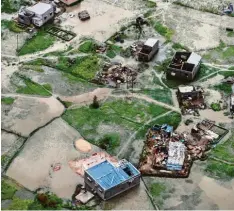  ?? Foto: Adrien Barbier, afp ?? Wo Idai wütete: Blick auf ein Viertel der Metropole Beira in Mosambik am Mittwoch. Teile der Großstadt sind von der Außenwelt abgeschnit­ten.