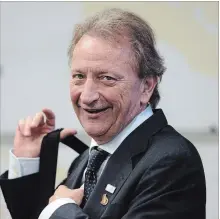  ?? SEAN KILPATRICK THE CANADIAN PRESS ?? Ottawa Senators owner Eugene Melnyk wants more fan support; and they want a better team in the city.