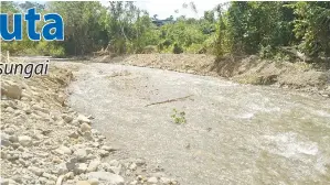  ??  ?? KELIHATAN Sungai Ulu Liawan setelah dilurus dan perdalamka­n.