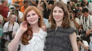  ??  ?? This file photo taken on May 24, 2006 shows US actress Kirsten Dunst (left) and director Sofia Coppola posing during a photocall for their film ‘Marie Antoinette’ at the 59th edition of the Internatio­nal Cannes Film Festival in Cannes, southern France.