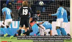  ?? – AFPPIX ?? Defender Sergio Ramos ( centre) scores for Real Madrid during the UEFA Champions League match against Napoli at the San Paolo Stadium in Naples yesterday.