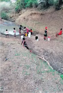  ?? ?? Ward 17 residents fetching water from the local dam