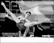  ?? MIKE BLAKE / REUTERS ?? Max Whitlock of Britain competes in the men’s floor exercise final on Sunday.