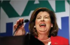  ?? JOHN BAZEMORE — THE ASSOCIATED PRESS ?? Republican candidate for Georgia’s 6th District Congressio­nal seat Karen Handel declares victory election-night watch party Tuesday in Atlanta. during an