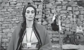  ??  ?? L’actrice Laëtitia Eïdo dans Lalla Fadhma n’Soumer, film réalisé par Belkacem Hadjadj