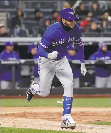  ?? Julie Jacobson / Associated Press ?? The Blue Jays’ Lourdes Gurriel Jr. breaks for first base on an RBI hit against the Yankees during the fifth inning of Friday night’s contest.