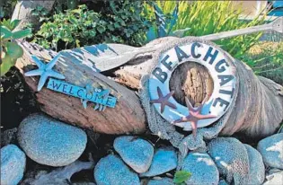  ?? Michele Bigley ?? BEACHGATE Trail’s welcome display, maintained by a local resident, is on the way to Seacliff.