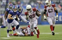  ?? ADAM HUNGER ?? Arizona Cardinals’ Chase Edmonds (29) runs the ball for a touchdown during the second half of an NFL football game against the New York Giants, Sunday, Oct. 20, 2019, in East Rutherford, N.J.