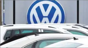  ?? PAUL J RICHARDS/AFP ?? The logo of German carmaker Volkswagen is seen at a dealership in Woodbridge, Virginia, on September 29, 2015.