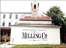  ?? LYNN KUTTER ENTERPRISE-LEADER ?? This is the logo for Washington County Milling Co. Marcus Nall hired a sign company to design the logo. (Left photo) The inside dining room. The building is open for weddings, receptions, reunions and other activities. This building was built in 1919...