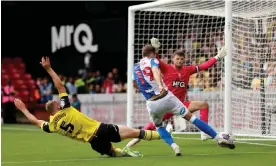  ?? Championsh­ip. Photograph: Luke Walker/Getty Images ?? Ryan Hedges scores the winning goal for Blackburn at Watford, a result that sent them ninth in the