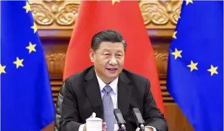  ?? ?? In this photo released by Xinhua News Agency, Chinese President Xi Jinping speaks during a video conference with European leaders from Beijing on Wednesday, Dec. 30, 2020.
