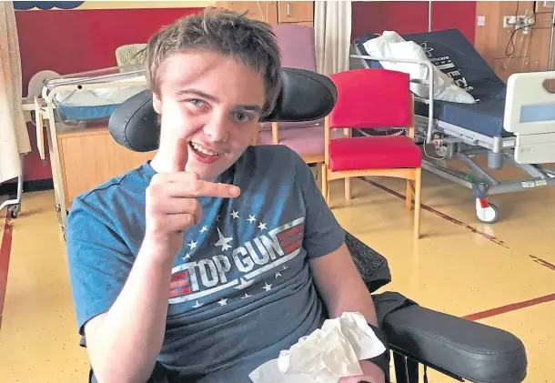  ??  ?? PROGRESS: Blairgowri­e youngster Kieran Lamond, 15, is improving after sustaining a severe brain injury when he fell off his bike in October.