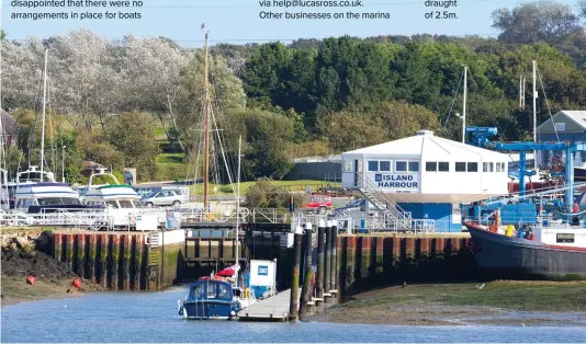  ?? ?? Island Harbour Marina has 222 berths; entry and exit is via lock gates
