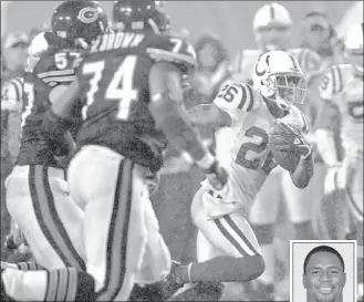  ?? | TOM CRUZE~SUN-TIMES ?? When playing for the Colts, Kelvin Hayden runs back an intercepti­on for a touchdown against the Bears in Super Bowl XLI.