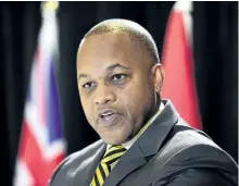  ?? FRANK GUNN/THE CANADIAN PRESS ?? Justice Michael Tulloch releases his recommenda­tions on how to enhance oversight of policing in the province at a news conference in Toronto on April 6. The Liberal government has appointed Tulloch to conduct a review of the police practice of carding.