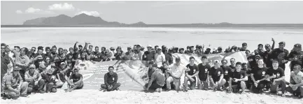  ??  ?? The organisers and volunteers after the Tun Sakaran Marine Park Ocean and Beach Clean-up.