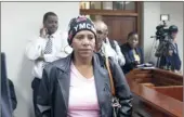  ??  ?? AT LAST: Corlia Olivier, Anene Booysen’s foster mother, arrives at court. ‘I am relieved’, she told a lawyer after the sentence was handed down.