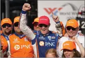  ?? JEFF ROBERSON — THE ASSOCIATED PRESS ?? Scott Dixon celebrates after winning an IndyCar auto race at World Wide Technology Raceway, on Aug. 27in Madison, Ill.