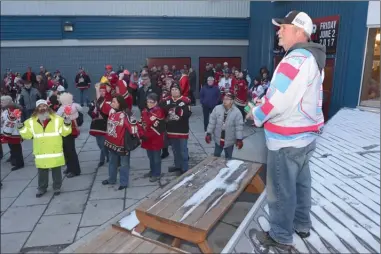  ?? GARY NYLANDER/The Daily Courier ?? Larry McLean speaks to more than 100 fans of the West Kelowna Warriors who attended a save-the-team rally Tuesday at Royal LePage Place. Last month, Warriors owner Mark Cheyne told West Kelowna city officials the team was up for sale.