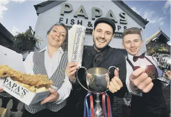  ??  ?? Papas Fish and Chips is celebratin­g their top award by offering residents 1p fish and chips, in conjunctio­n with The Scarboroug­h News. Staff Hannah Willson, George Papas and Ryan Tarry. Picture Richard Ponter 171004a