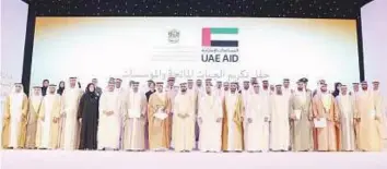  ?? Courtesy: Dubai Media Office ?? Shaikh Mohammad Bin Rashid yesterday honoured a number of national humanitari­an and charitable organisati­ons during a ceremony organised by the Minister of Foreign Affairs and Internatio­nal Cooperatio­n.