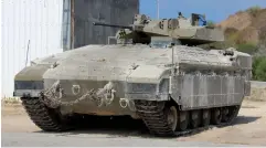  ?? (Courtesy/Defense Ministry) ?? THE NAMER armored personnel carrier has received new technology, armor and weaponry, including a mounted 30mm gun.