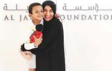  ??  ?? Euale Mengsitu Besir with Aisha Shahdad who heads Al Jalila Foundation’s A’waen programme.