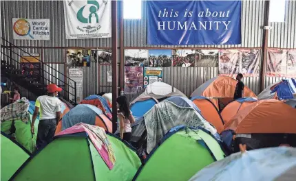  ?? AFP VIA GETTY IMAGES ?? Families live in tents on the border in Mexico as Title 42 and “remain in Mexico” policies continue.